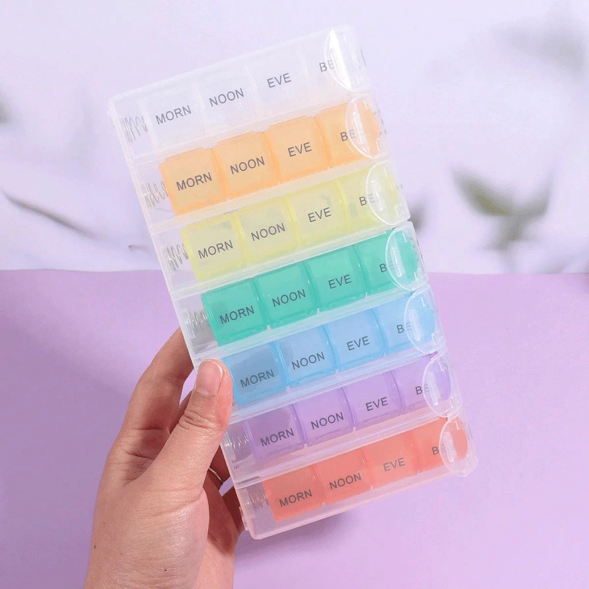 Portable 7-Day Multifunctional Pill Organizer with Spring Pop-Up Compartments