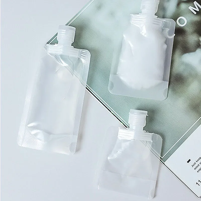Set of 5 Refillable Travel Cosmetic Bottles and Pouches - Assorted Sizes