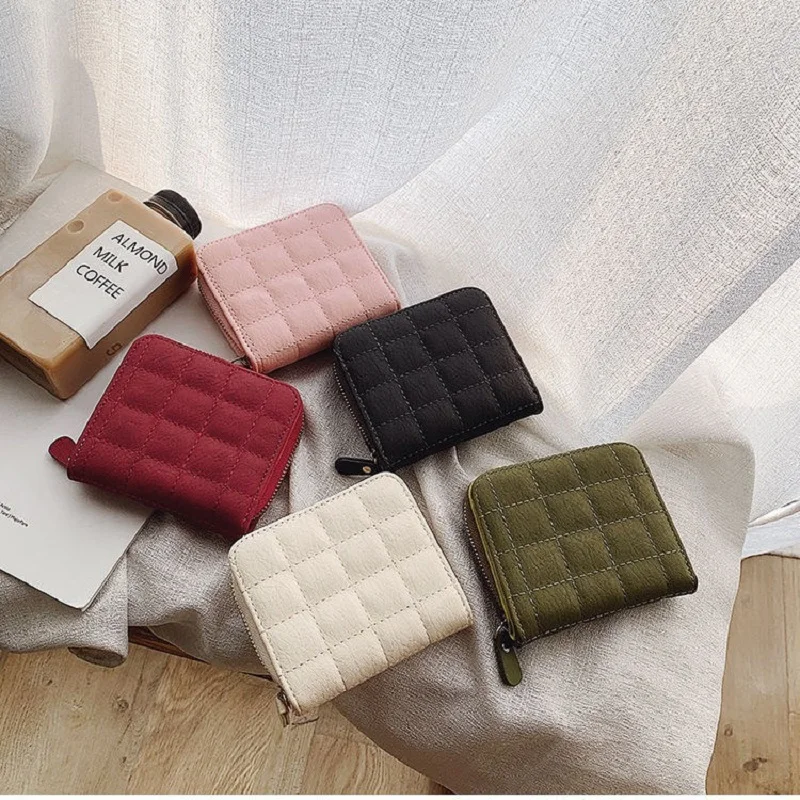 Elegant Women's Minimalist Leather Clutch with Embroidered Design