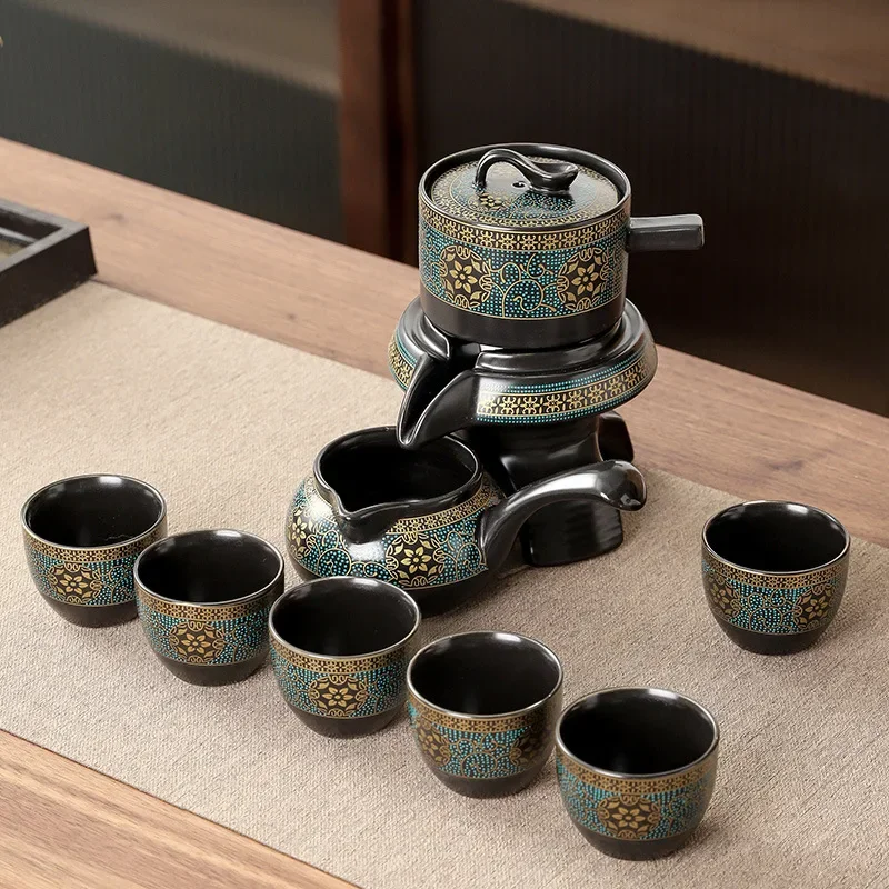 Creative Ceramic Tea Set with Rotating Teapot - طق...