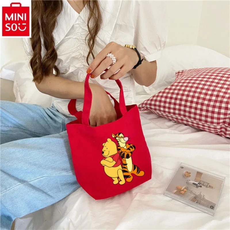 MINISO Disney Fashion Canvas Bag Handbag Women's Cartoon Winnie Bear Print Makeup Storage Sweet and Fresh Portable Handbag