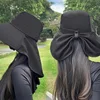 Ladies' fashionable sunscreen bucket hat with ponytail hole, adjustable drawstring closure, suitable for outdoor and casual wear