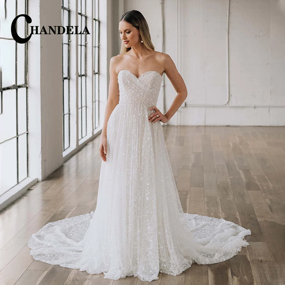 

CHANDELA Sparkly A Line Wedding Dresses Sequines Sweetheart Tulle Sleeveless Backless Court Train Abito Da Sposa Personalised