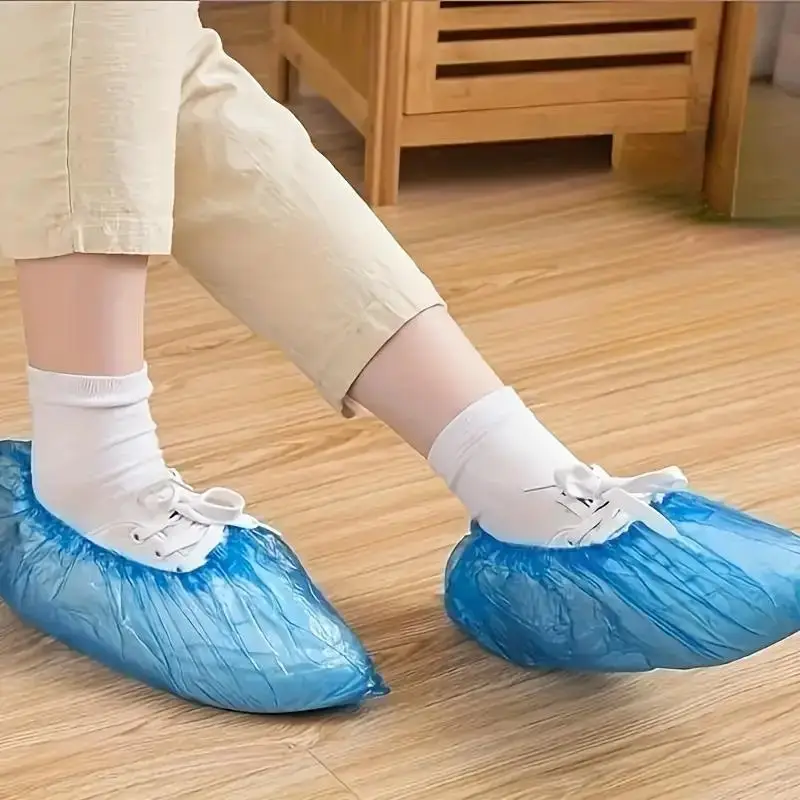 100PCS Hospital-Grade Shoe Covers-Anti-Slip Heavy-Duty PE Protection for Healthcare, Home Cleaning & Travel Hygiene