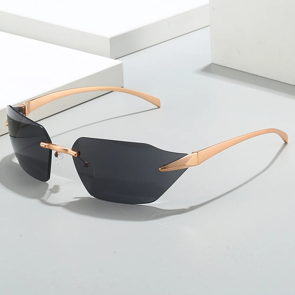 New Frameless Edge-cut One-piece Curved Sunglasses For Women, High-end Trendy Metal Car Sunglasses 81069