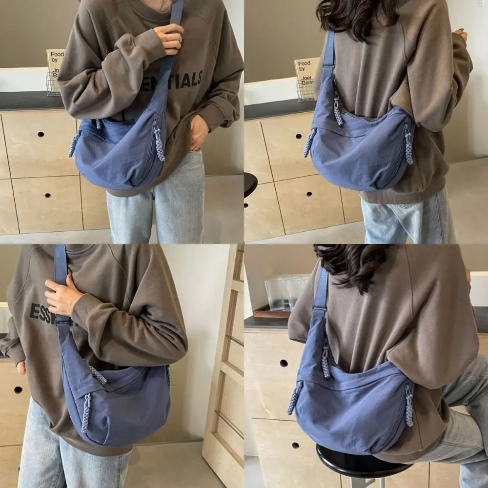 รูปสินค้า กระเป๋าสะพายข้างผ้าแคนวาส จุใจสไตล์เกาหลี