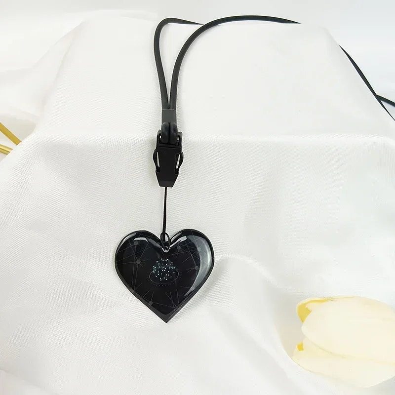 

TerraHertz power card black heart shaped pendant with silicone ion chain