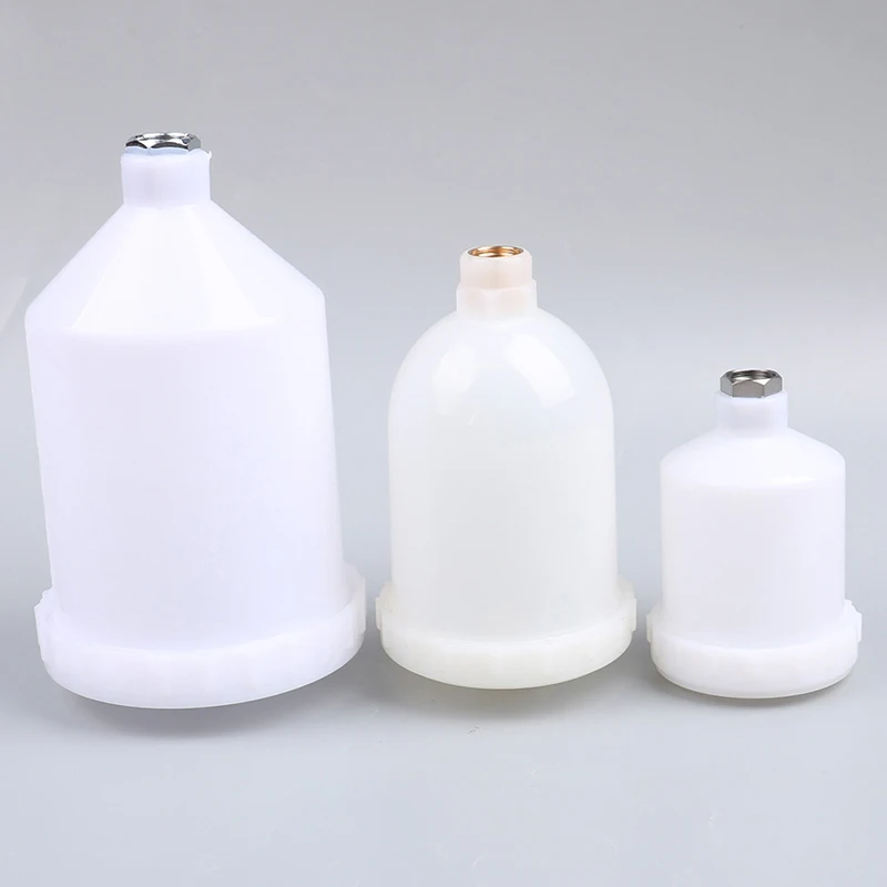 Plastic spray paint container, air gravity feed connection, thread connector for spray gun tools, spray cup, from from from from outside, from from from from outside.