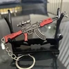 Free Base Mini AKM Gun Keychain PUBG Game Peripherals Metal Weapon Model Alloy AK 47 Light Key Chain Car Pendant Gift Toy 1