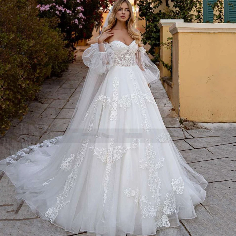 

Pretty Sweetheart Wedding Dresses A-Line White Sexy Backless Lace Applique Off Shoulder With Sleeves Fluffy Mopping Bridal Gown