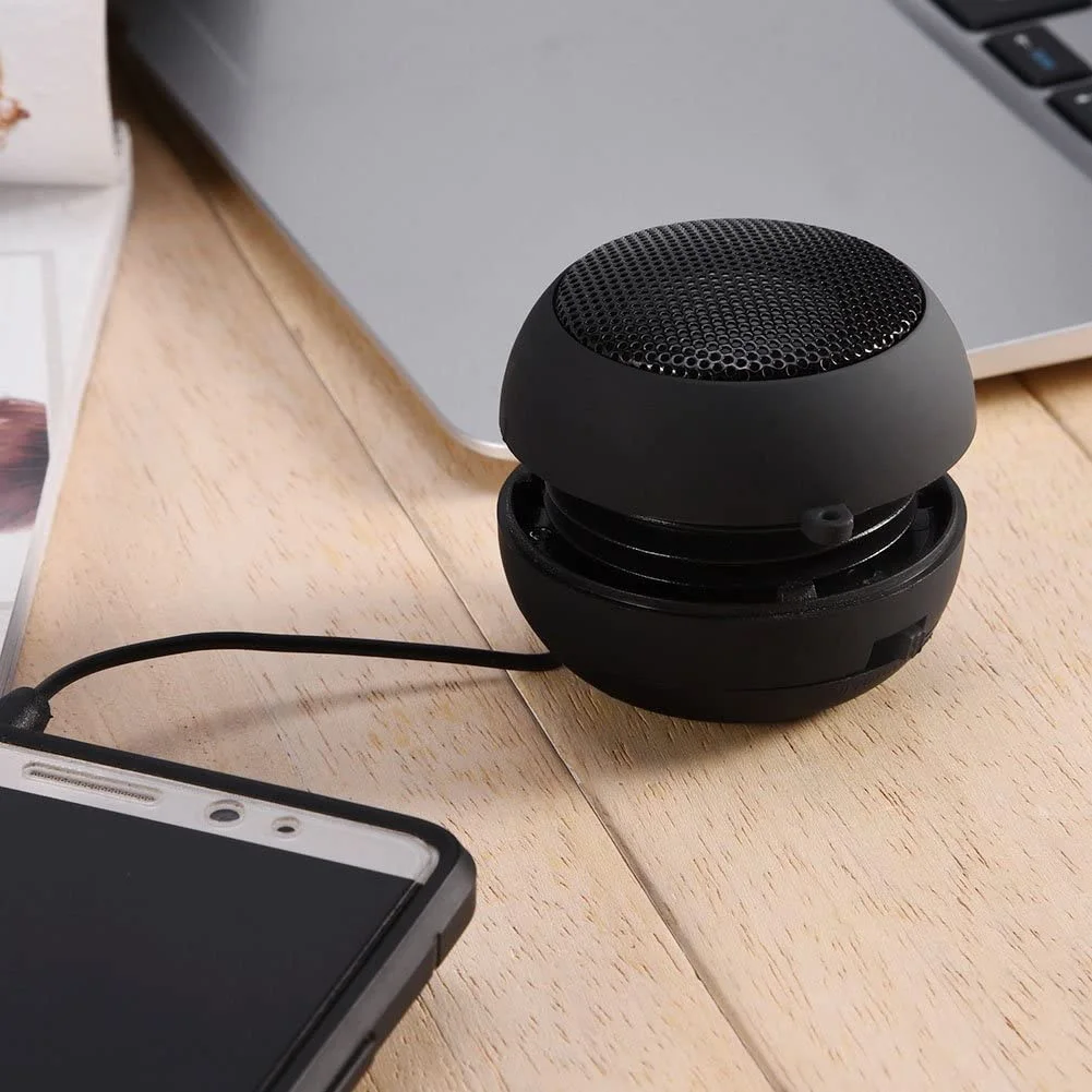 Compact Travel Loud Speaker with Built-in Battery and Retractable Design