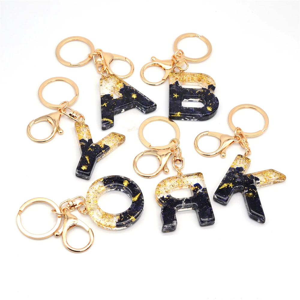 wiwjygz 1pc Black Pompom Letter Keychain English Alphabet Keyring Glitter Gradient Resin Car Mirror