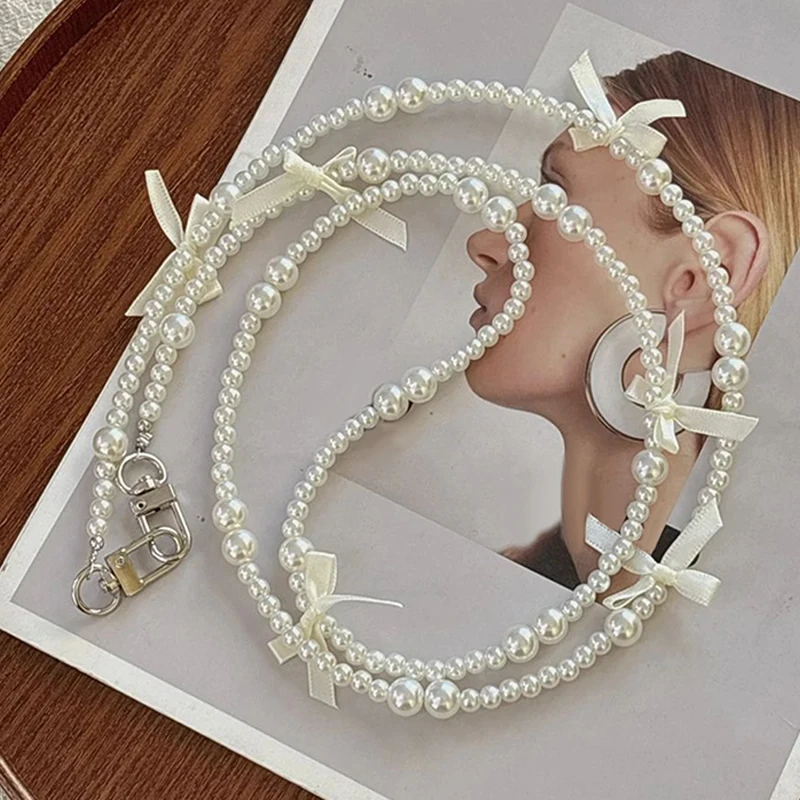 Elegant Pearl Bow Crossbody Phone Lanyard with Universal Anti-Lost Design