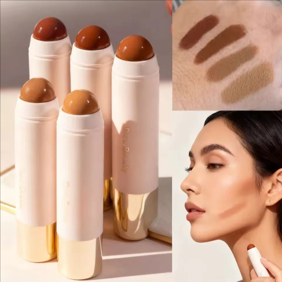 Set trucco Rare Beauty: liquido per il viso, bronzer, stick per contouring, correttore, crema per contouring del naso, ombretto, fondotinta nutriente e illuminante._voghion.com