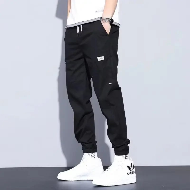 thumbnail image 1 of Pantalones cargo holgados y modernos con frunces, pantalones casuales recortados a la moda para hombres, tendencia juvenil de primavera y otoño, color sólido, 1 of 5