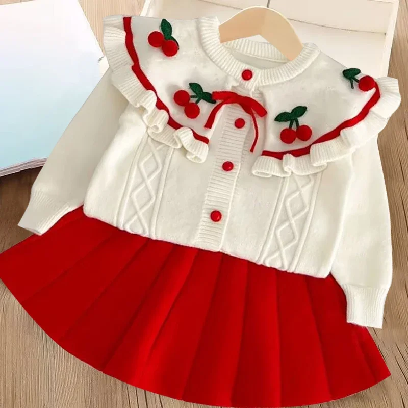 Mädchen Strickrock Set Herbst/Winter Neues Baby Gestricktes Hemd Mantel Kurzer Rock Zweiteiliges Set Niedlicher Kirschdruck Neujahrskleidung