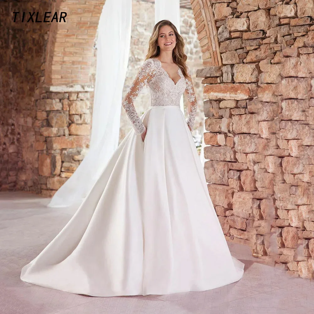 

TIXLEAR Classic V-Neck Wedding Dress Pockets Long Sleeves Appliques Illusion Floor Length Bridal Ball Gown Button Vestidos New