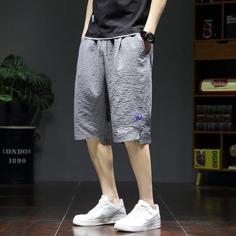 Sports Stylish Printed Casual Shorts Summer Korean Loose Straight Men's Clothing All-match Youthful Vitality Elastic Knee Pants