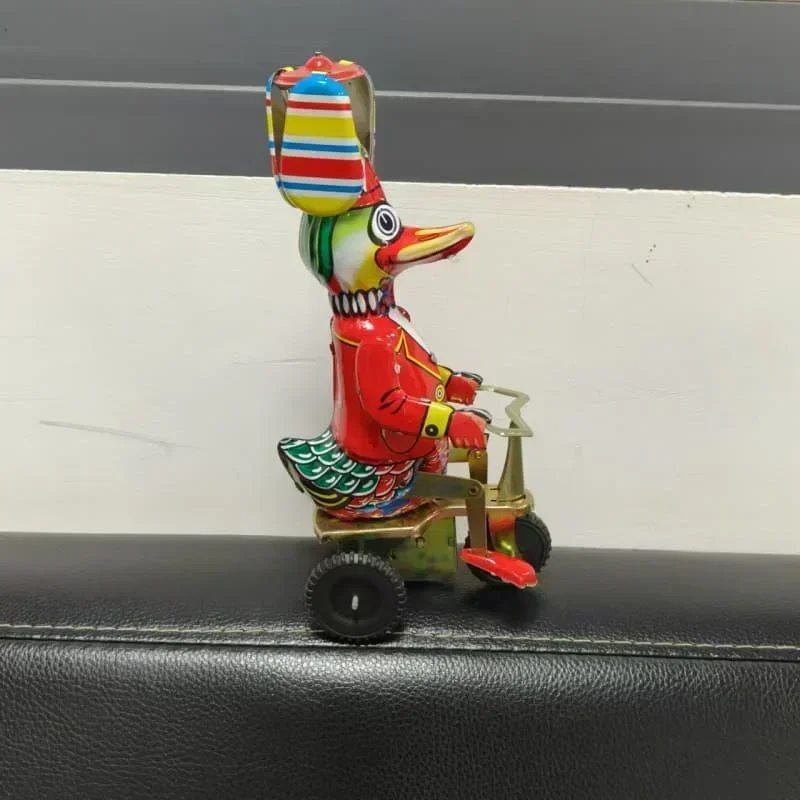 Adult Collection Retro Wind Up Toy Metal Tin Duck on Bike Robot Mechanical Clockwork Toy Figure Model Kids Baby Gift