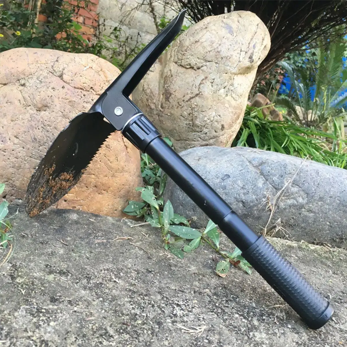 Description Picture 2 of itemFour in one multifunctional folding shovel for outdoor survival and camping - durable stainless steel with saw, pickaxe, and bot