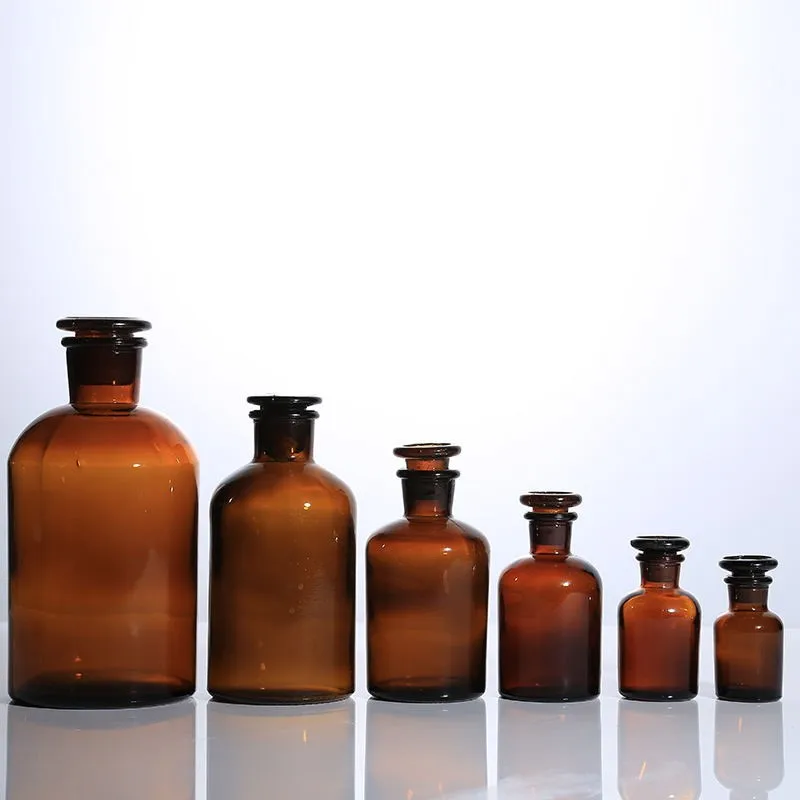 

Labs brown Reagent Bottle, Lead-free High Borosilicate glass, Narrow Neck with Stopper