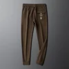 Luxury brand jacquard casual pants men's spring autumn high-end waffle elastic waistband drawstring pocket embossed sports pants 5