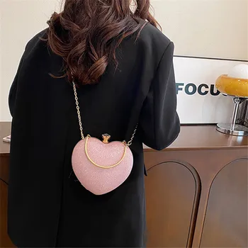 حقيبة يد أنيقة على شكل قلب بقفل، حقيبة مسائية عصرية على شكل نجمة لامعة، محفظة أنيقة بكتف واحد، حقائب كروس على شكل سلسلة. 4