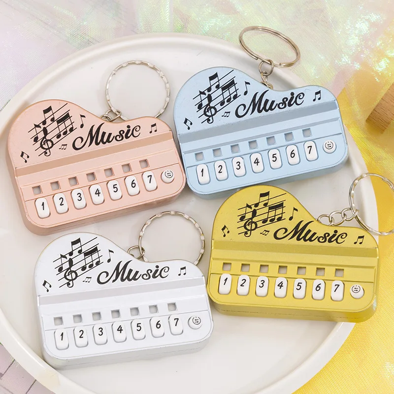 1Pcs 재생 가능한 미니 전자 피아노 키 체인 펜던트 빛나는 피젯 음악 장난감 창조적 인 생일 파티 작은 선물 장식 장난감