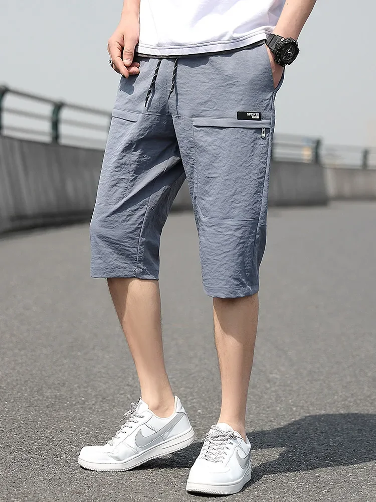 Description Picture 5 of itemPlus Size Summer Capris Pants Men Breathable Cool Calf-Length Short Sweatpants 3/4 Straight Loose Casual Cropped Trousers 8XL