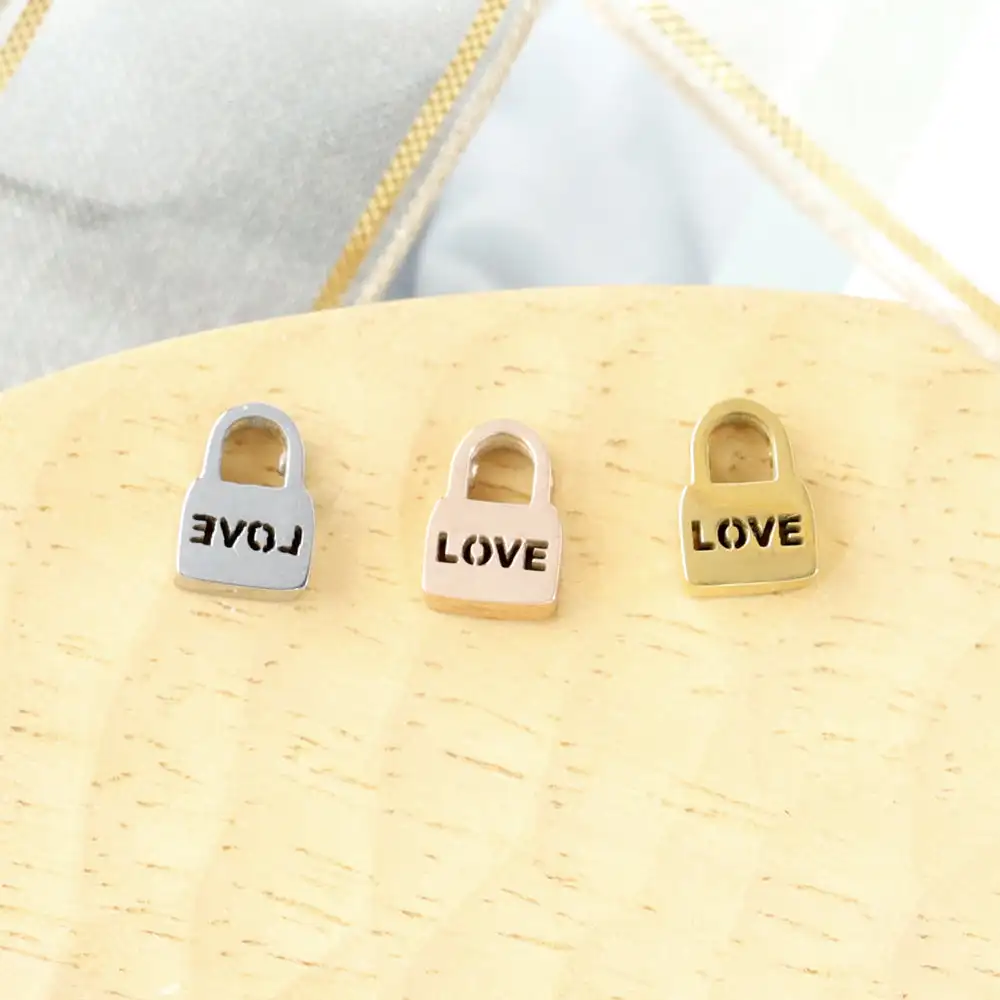 

10pcs 10X7mm lock pendant with hollow LOVE