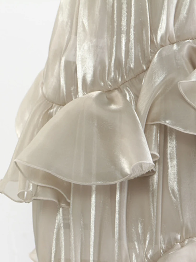 [EAM] High Elastic Waist Champagne Glossy Ruffles Irregular Half-body Skirt Women Fashion Tide New Spring Autumn 2026 1DJ0349