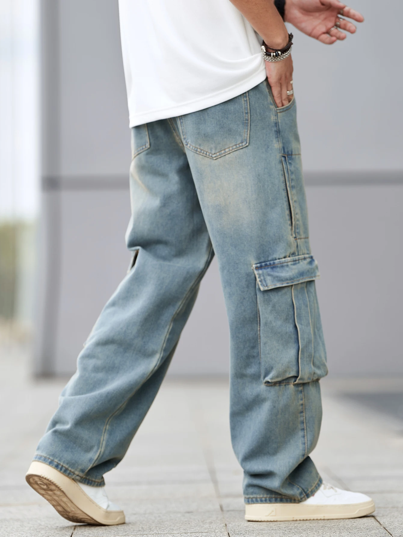 Men's workwear jeans. Loose denim trousers. Workwear street style. Fashionable and trendy denim men's clothing. 2
