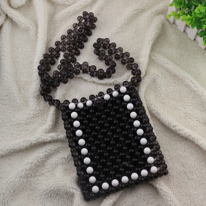 

Customized Black White Bead Splicing Handmade Woven Women's Mobile Phone Bag New Fashionable Ins Flip Design Crossbody Bags