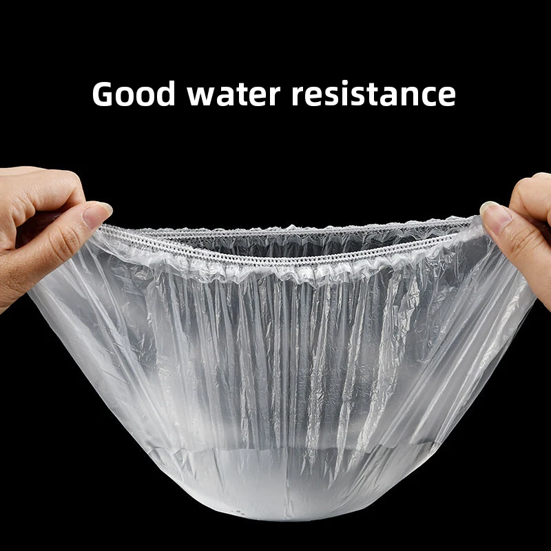 100 قطعة غطاء دش بلاستيكي للاستعمال مرة واحدة قبعا...