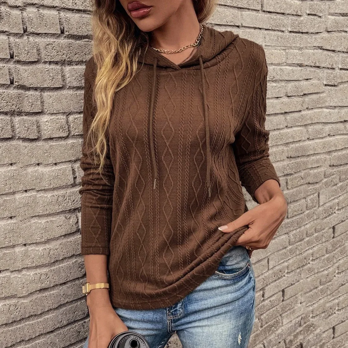 Woman wearing pullover lifestyle