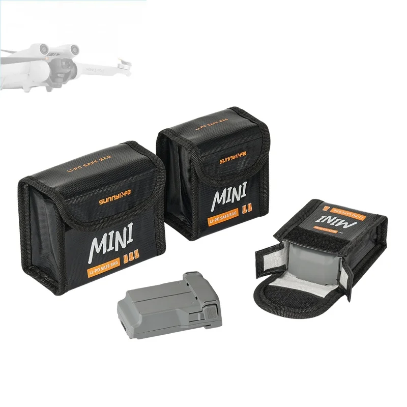 Sac de rangement ignifuge pour batterie DJI Mini 5/4/3 Pro vu de côté, avec fermeture éclair et poignée de transport.