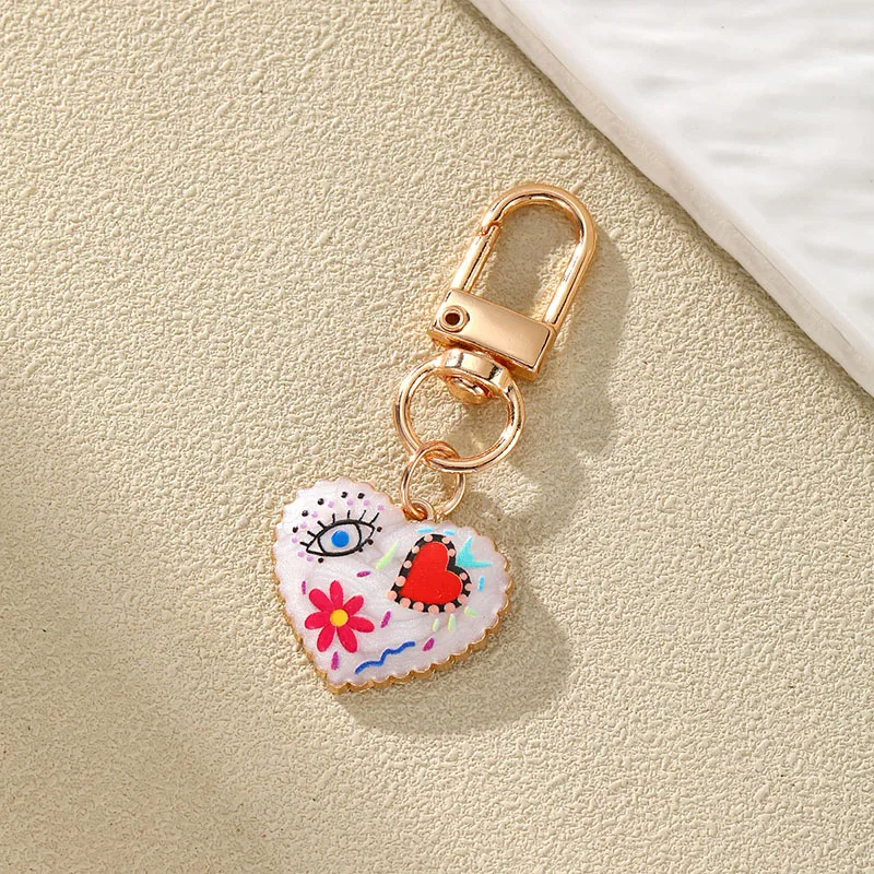 Neue gedruckte Tropf öl Teufels auge Schlüssel bund für Frauen Mode Blume Herz Gold Farbe Schlüssel Schnalle Tasche Kopfhörer Fall Schmuck Geschenk – Detail 16