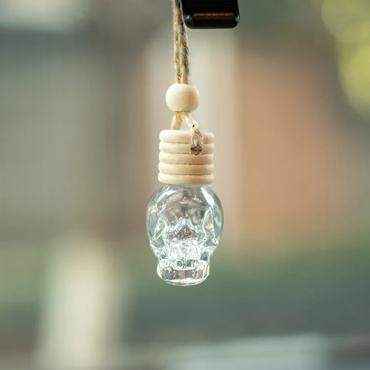 

2pcs Car Skull Perfume Bottle Ornament Aromatherapy Essential Oil Bottle Hanging Auto Air Freshener Decoration Interior for Home