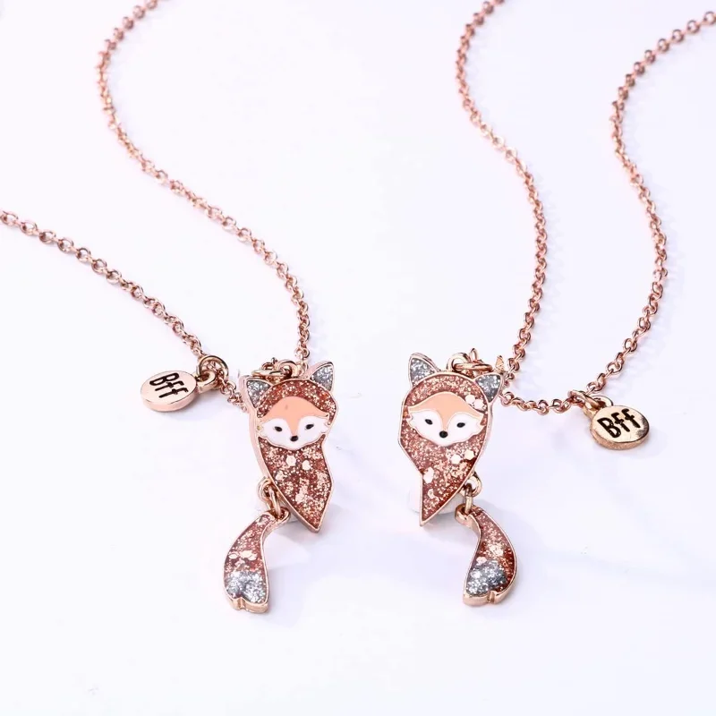 Collana con ciondolo a forma di farfalla e madre-sorelle in oro rosa 14 carati con rubini e pietre preziose