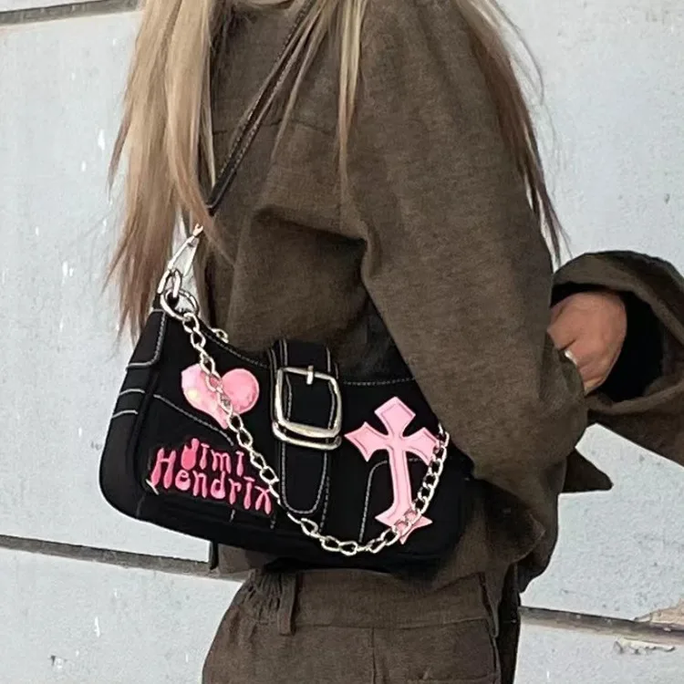 

Hello Kitty original new niche high-end sweet and cool crossbody bag hot girl chain motorcycle baguette armpit bag for women