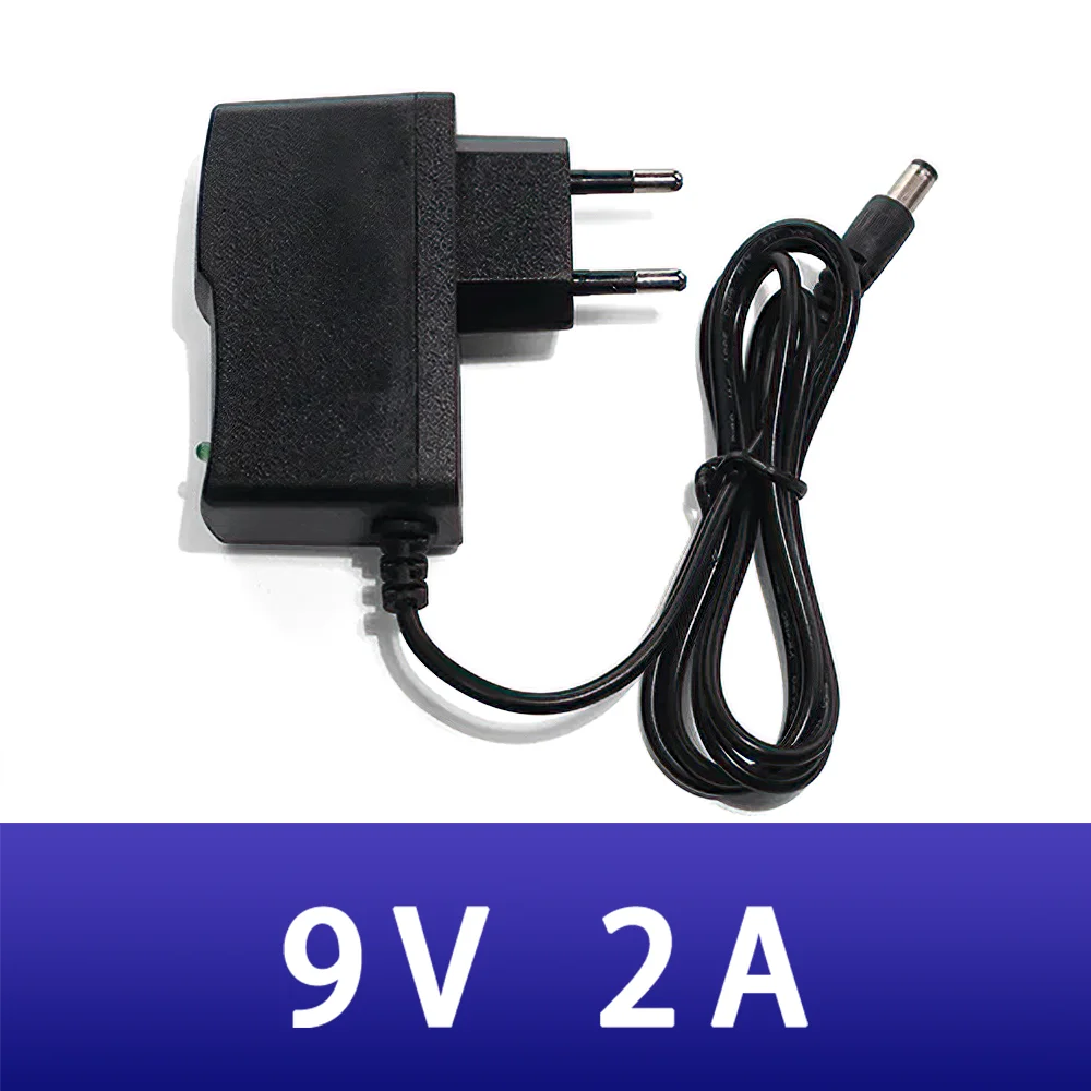 

AC DC High quality 9V 2A Switching Power adapter Reverse Polarity Negative Outside EU AU US UK 5.5mm x 2.1mm plug for LED