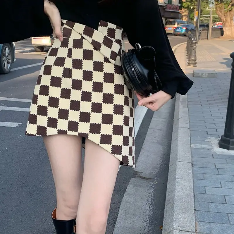 Irregular Chessboard Half Skirt with Irregular Design Sense Women's 2024 New A-line High Waisted and Hip Wrapped Skirt