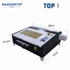 40w 50w Co2 Mini Laser Engraving Cutting Machine Plastic Wood Stone Engraver Cutter 4040 with Ruida Controller 6