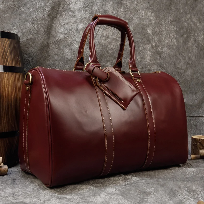 

Brand Name Luxury Designer Genuine Leather Mens Travel Bag Wine Red Smooth Natural Cowskin Duffle Bag For Male 2019 Latest Style