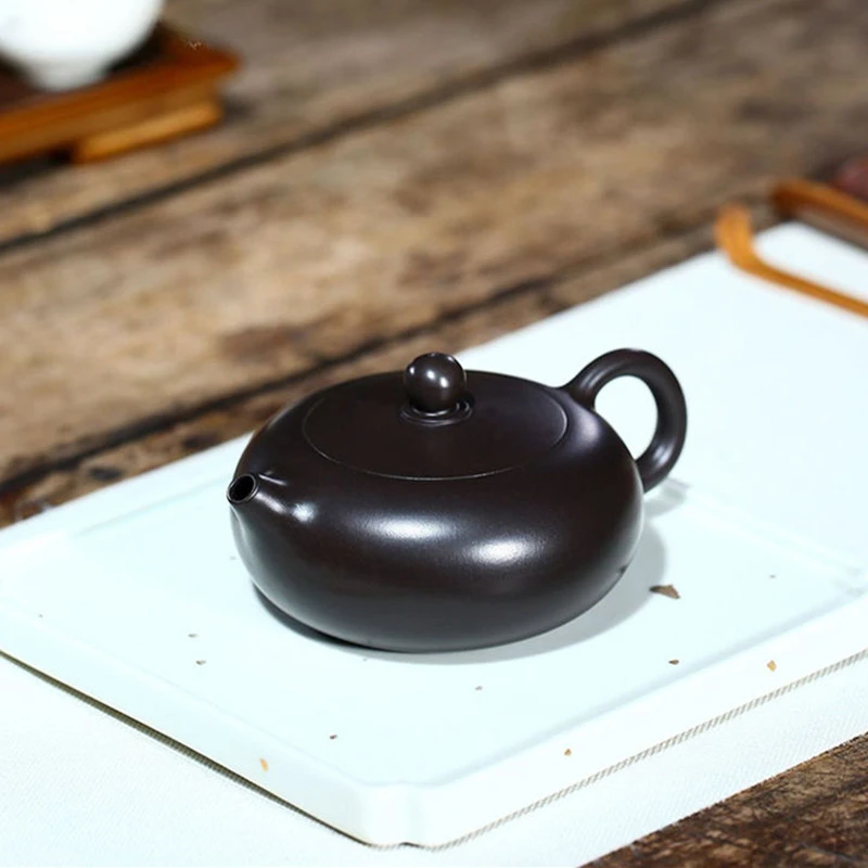 

160ml Chinese Yixing Purple Clay Tea Pot Boutique Black Mud Flat Xishi Teapot Home 9 Hole Filter Teaware Customized Tea Infuser