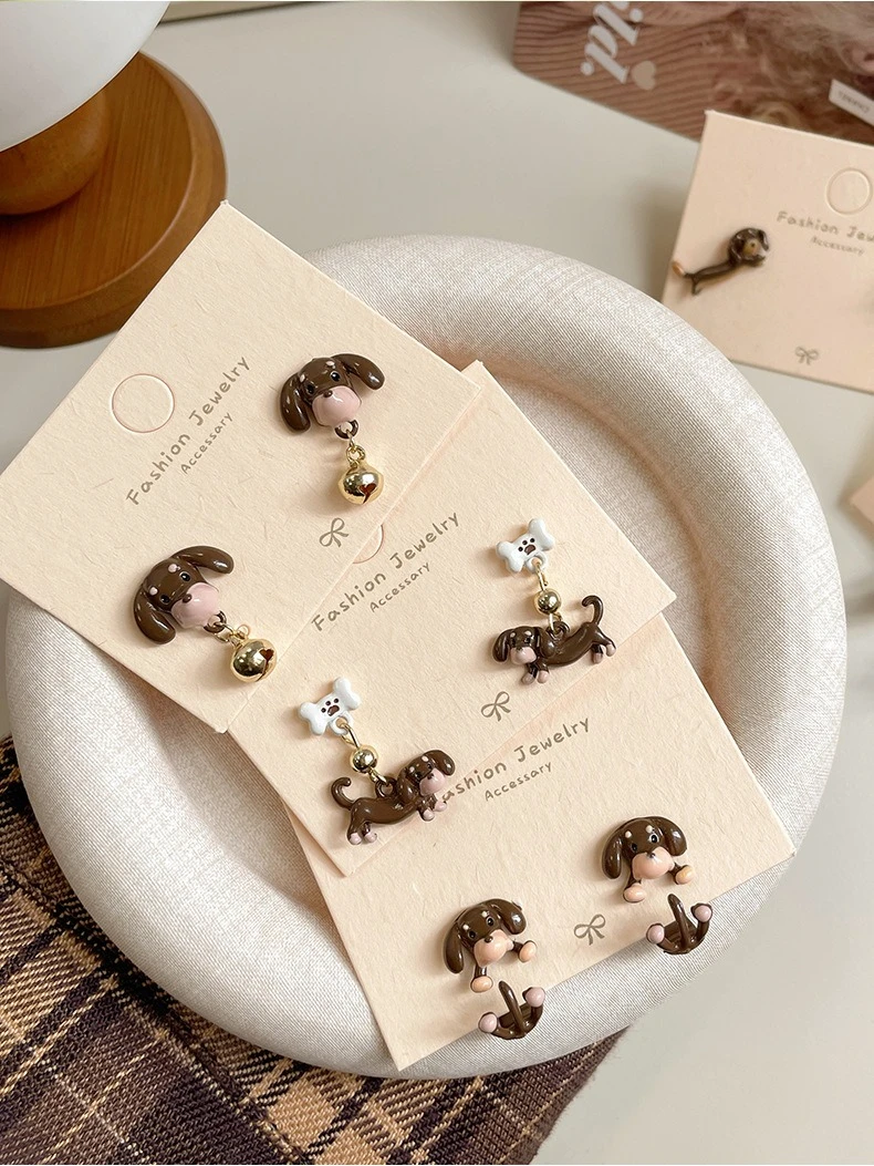 Adorable Wiener dog earrings on jewelry card