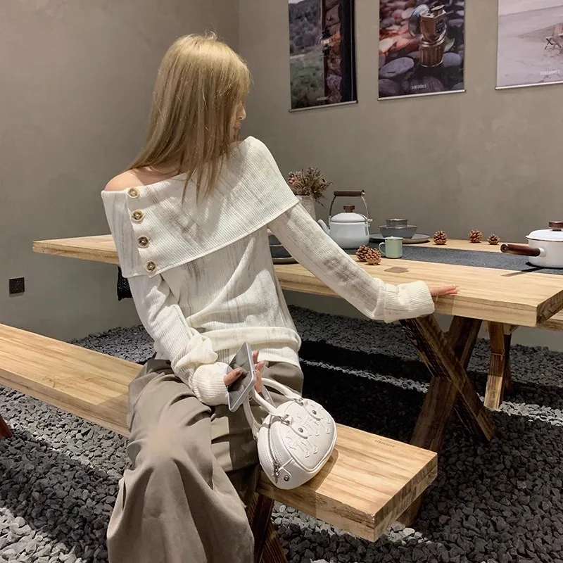 

2023 autumn and winter new render sense knitted line shoulder coat elegant temperament minority girl