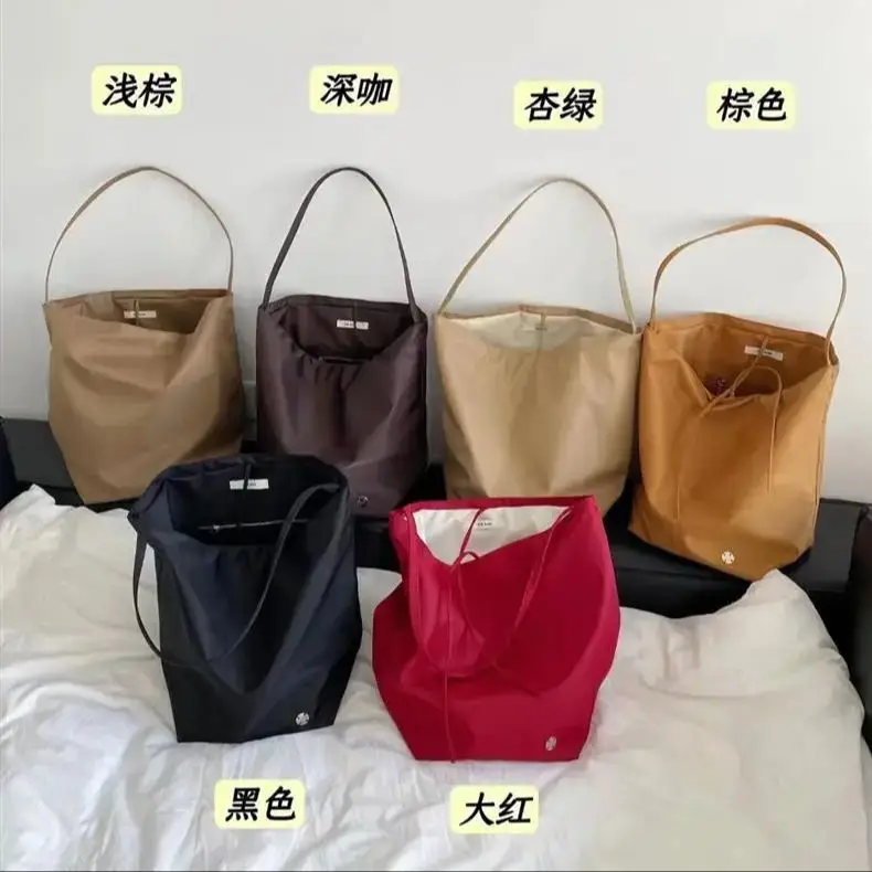 

2024 Luxury Designer Row Nylon Bucket Bag Large Capacity Tote Shoulder Bag Commuter Travel Versatile Fashionable Shoping Handbag