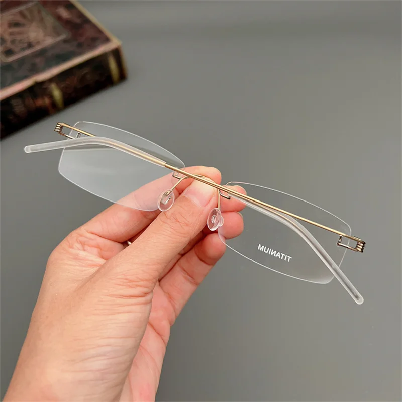 Dänemark Schraubenlose Schmale Quadratische Rahmen Brille Männer Business Rechteck Randlose Brillen Rahmen Ultraleicht Frauen Marke Brillen – Detail 30