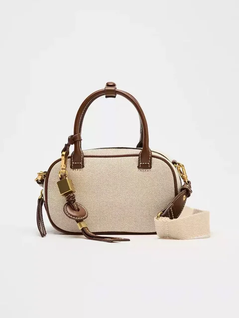 2025 New niche retro color-blocking hand-held small bag, stylish crossbody canvas PU small square bag, single-shoulder bowling b 1